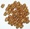 50 7mm Topaz & Gold Saturn Beads